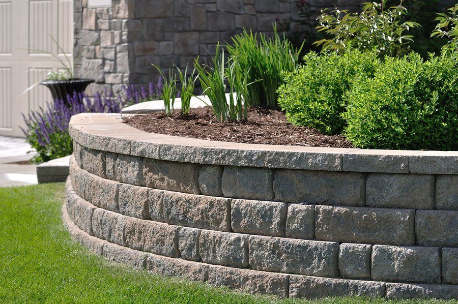 Retaining wall garden designed by Yorba Landscaping